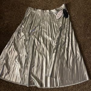 Silver Scoop Skirt. Never worn. Silver and flowy. Dress this up or down all year